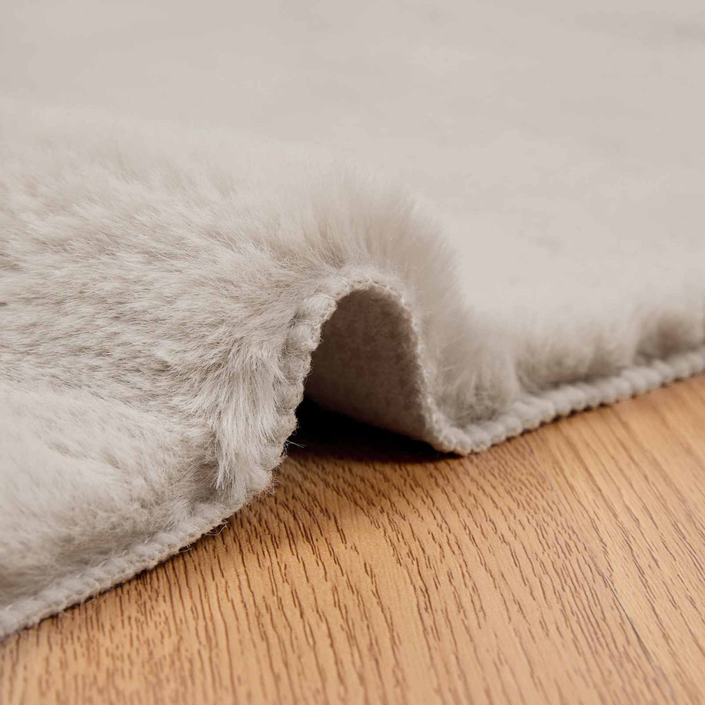 Rutschfester Kunstfellteppich Olite Beige