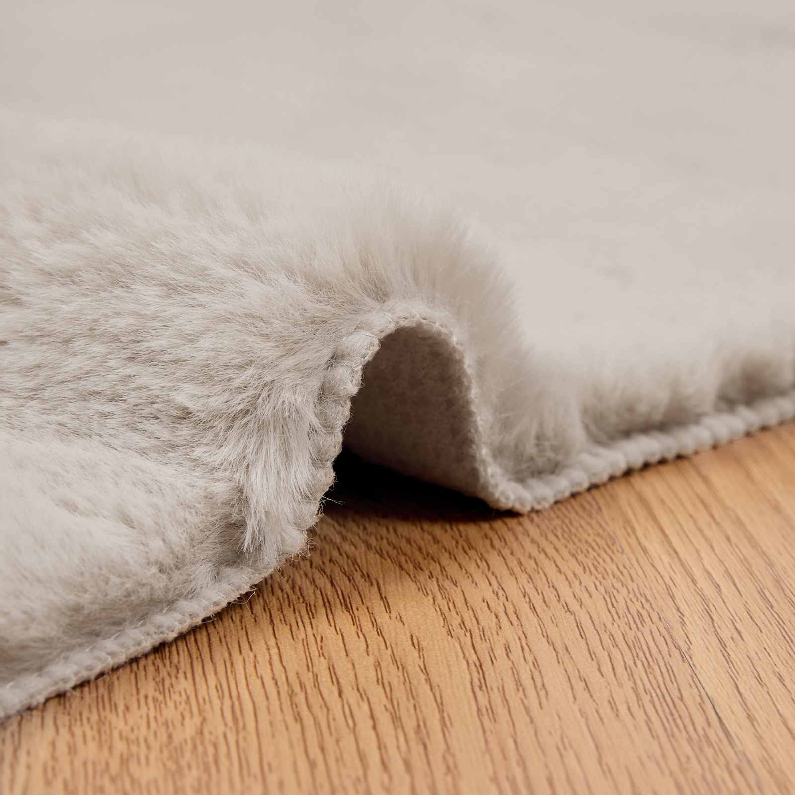 Rutschfester Kunstfellteppich Olite Beige