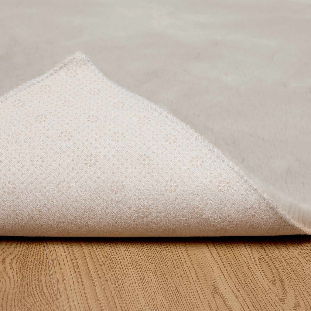 Rutschfester Kunstfellteppich Olite Beige